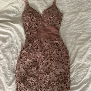 A rose mini dress with floral lace.